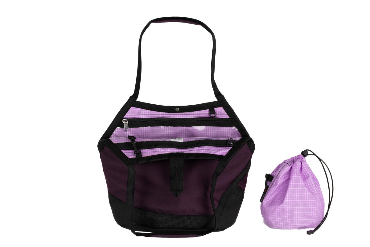 visible variant TB0660-UKYD^^A Swift in Aubergine Ballistic with Wisteria (light purple with white grid) 200 Halcyon interior and Yarn Stuff Sack.
