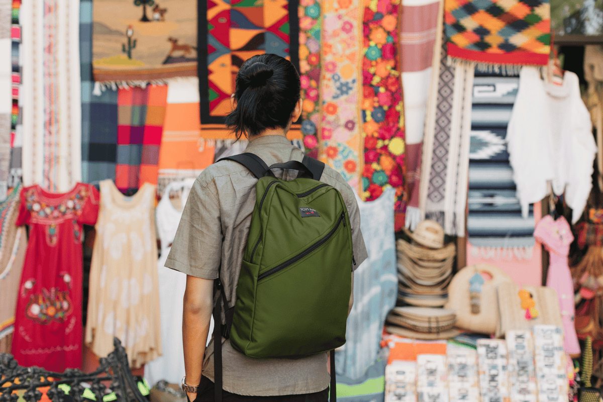 lifestyle visible^^Person wearing Darlight Backpack