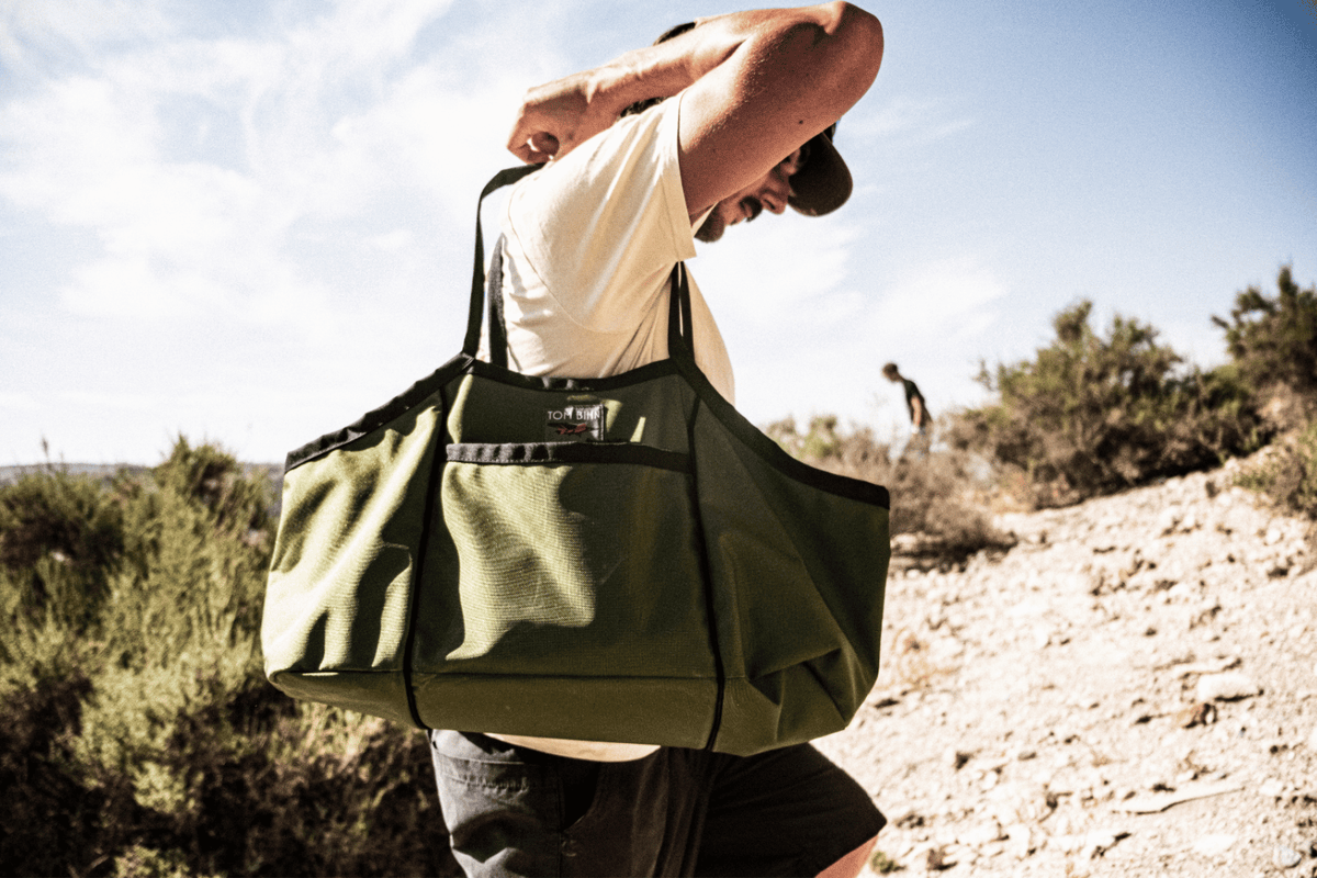 lifestyle visible^^A person shoulder carrying a Monster Truck.