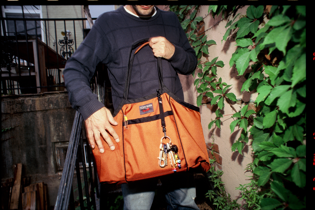 visible lifestyle^^Person carrying Truck, Key Strap attached. 