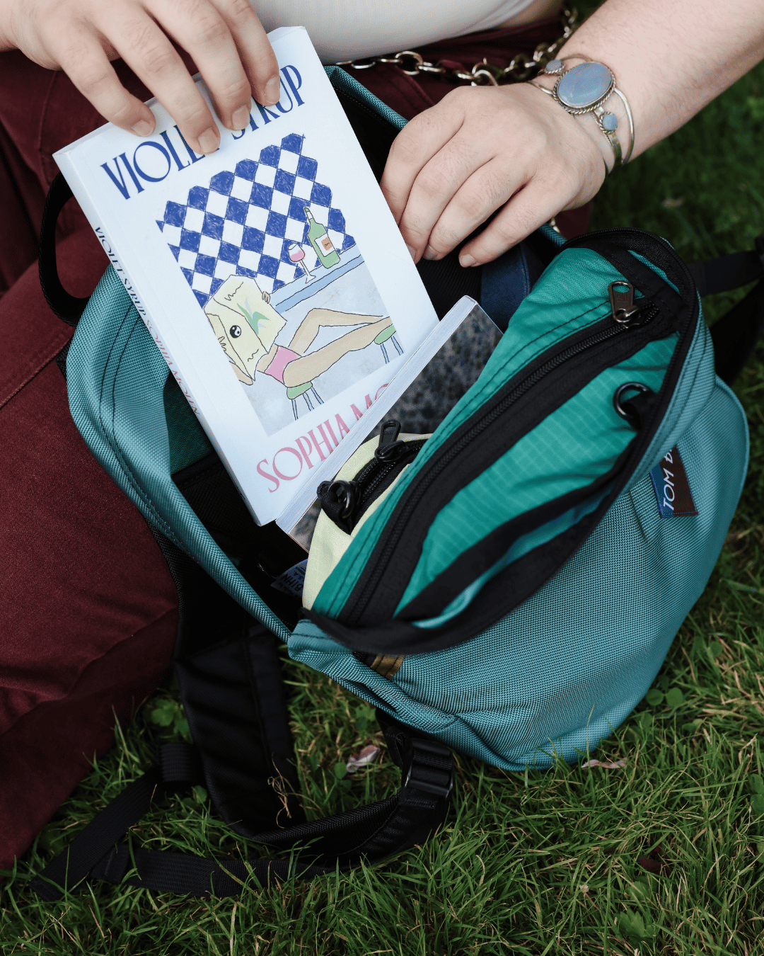  Person putting book in Zeitgeist.