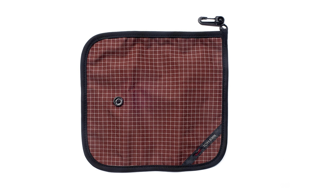 visible variant TB1235-6D^^The back of a Tool Pen Wrap in Moab (brick red with white grid) 200 Halcyon.