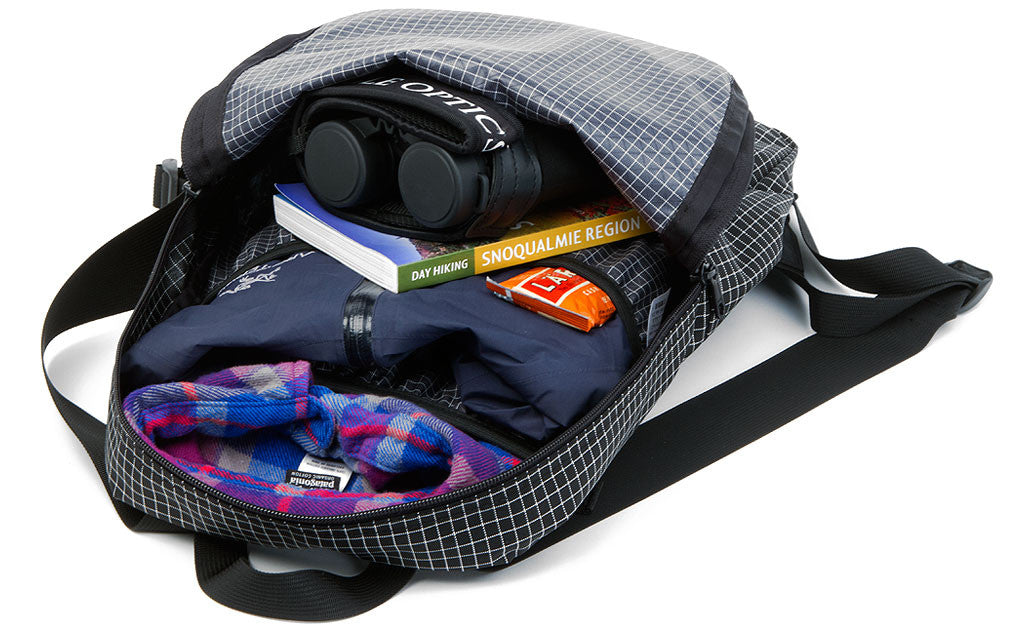 ^^Daylight Backpack with a full loadout including a jacket, hiking guide, binoculars, and trail rations.