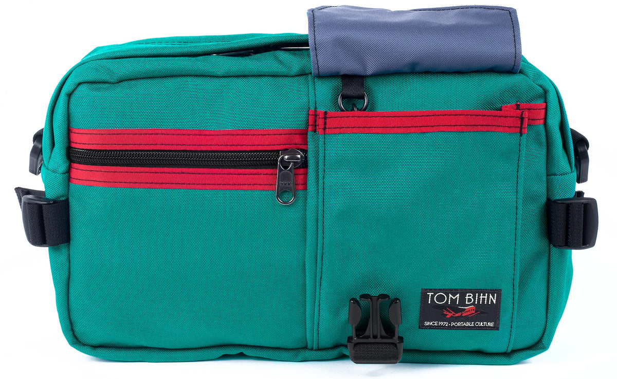 visible variant TB0425-MCDJ^^The LGD in Mayura/Red/Dawn. Front view, front buckle pocket lifted up to show the Dawn lining.