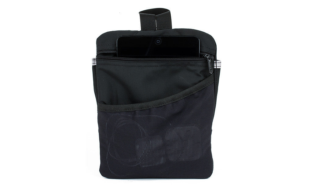 visible variant TB1833-BJ^^ The back of the Blcak Small Cafe Bag Freudian Slip. A Small e-Reader is in the zippered pocket, and a charger is in the slash mesh pocket.