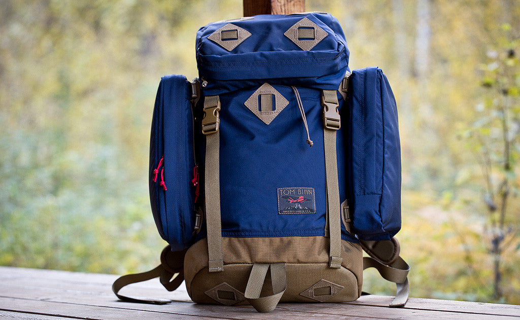lifestyle visible^^A Guide's Pack with two side pockets.