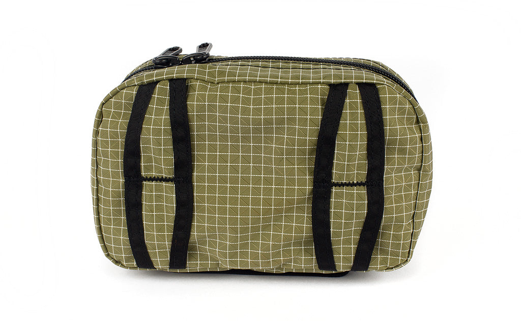 visible variant TB0418-8D^^Reverse shot of the Handy Little Thing #1 in Taiga (olive green with white grid) 200 Halcyon showing the attachment points.