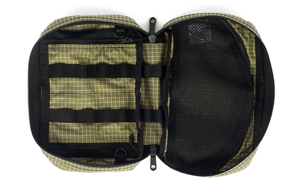 visible variant TB0419-8D^^An open interior shot of the Handy Little Thing #2 in Taiga (olive green with white grid) 200 Halcyon