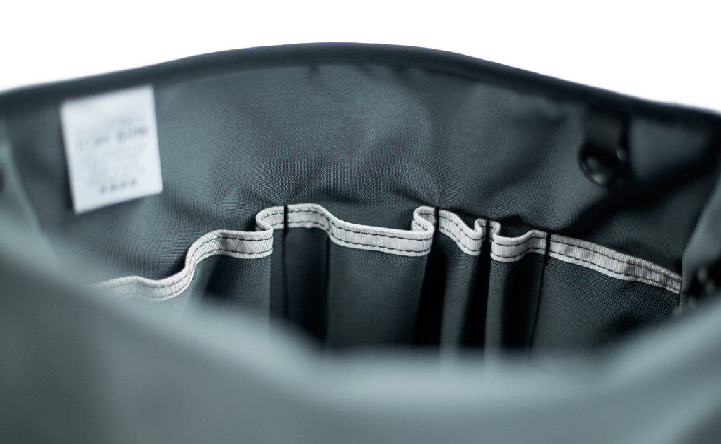 detail visible^^Close shot of the pen slots in the main compartment of the Large Cafe Bag.
