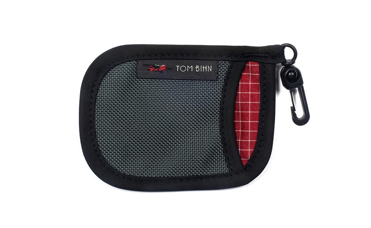 visible variant TB1229-SBID^^A Pocket Pouch in Steel with a Iberian interior.