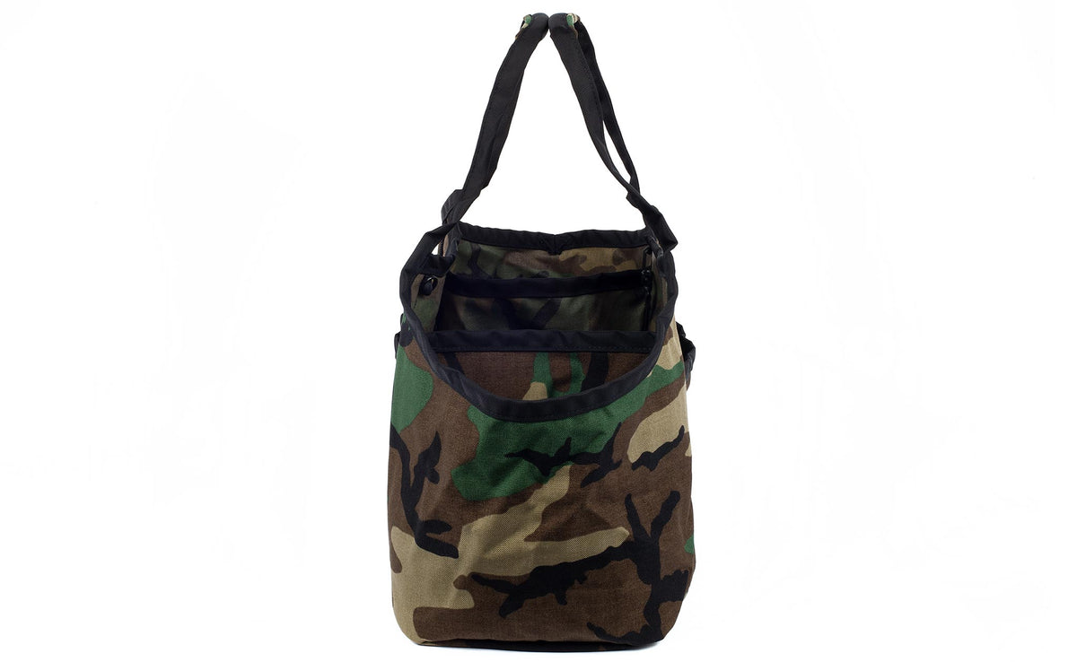 visible variant TB0618-EC^^Profile shot of The Monster Truck in Beaver Camo (green, brown, black, and yellow in a camoflauge pattern) 1000 Cordura.