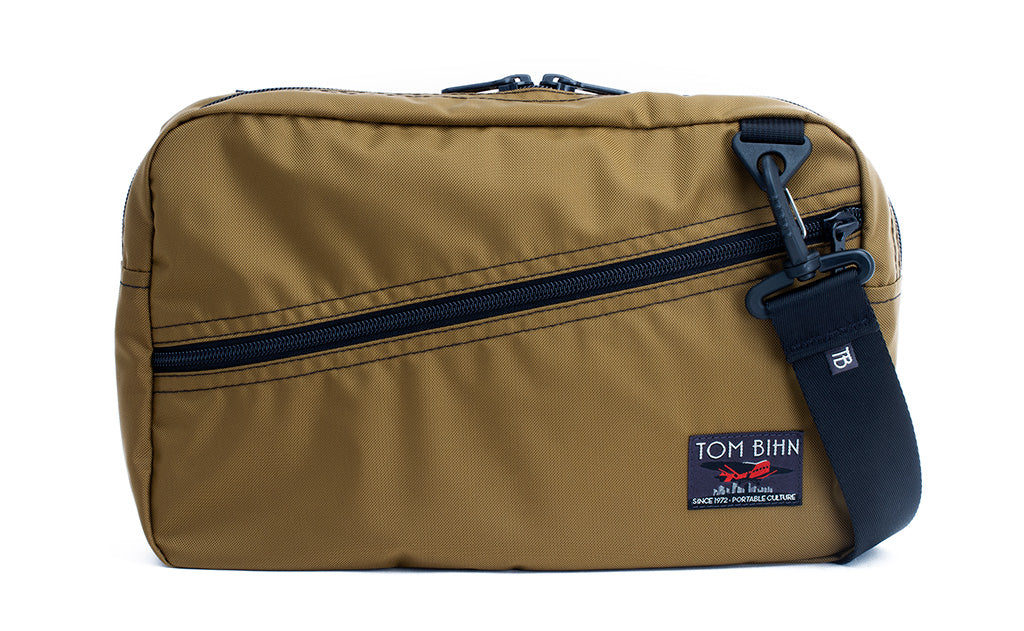 A Packing Cube Shoulder Bag in Coyote (tan) 210 Ballistic with a Simple Strap attached.