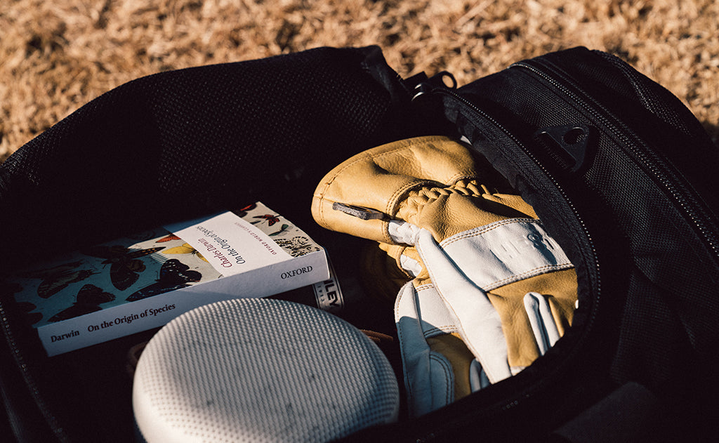 lifestyle visible^^A close shot the main compartment of a Road Buddy Duffel filled.