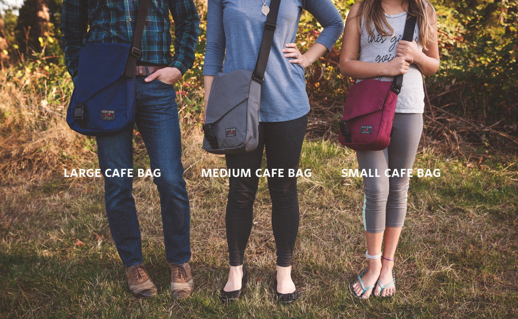 ^^A comaprison photo of people carrying the Small Cafe Bag, Medium Cafe Bag, and Large Cafe Bag.