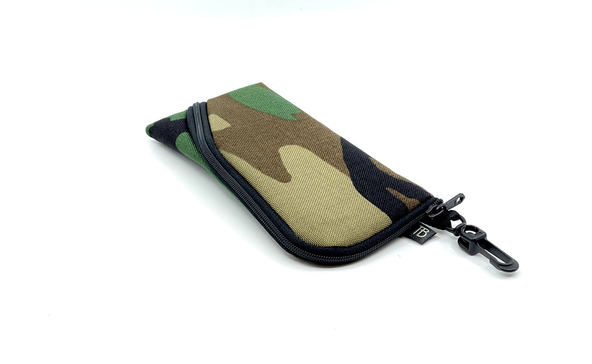 visible variant TB12452-EC^^ A Small Ghost Whale Pouch in Beaver Camo (green, brown, tan, and black camoflauge pattern).