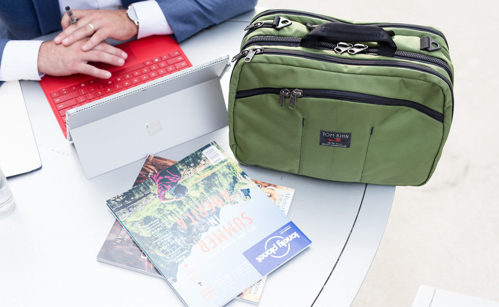 lifestyle visible^^A person with their Stowaway on a table while they're using their tablet.