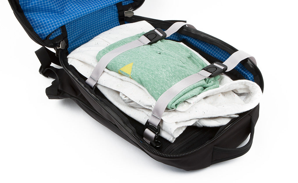 Main compartment tie-down straps in use