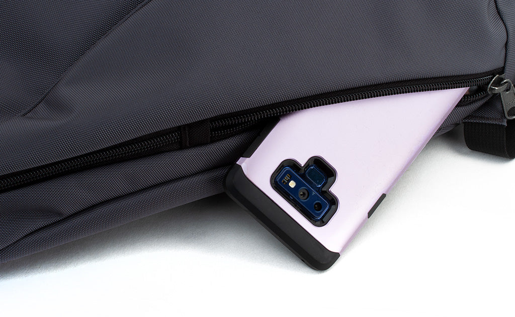 detail visible^^A phone in the small side pocket.