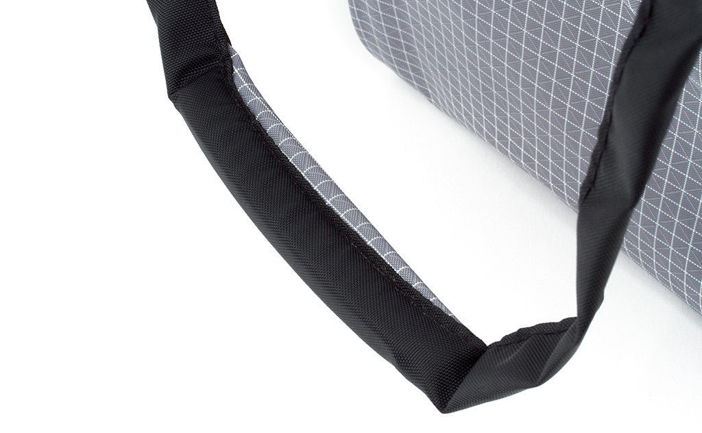 A close shot of the padded handle on the Original Small Shop Bag.