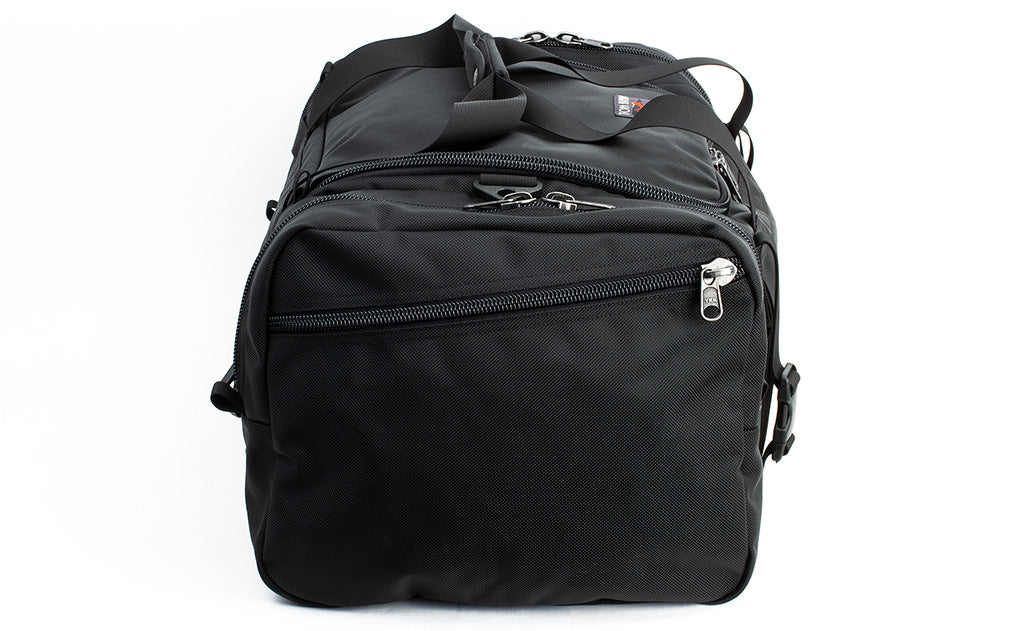 visible detail^^A side shot of the Road Buddy Duffel 60 showing the Fabric Side Pocket.