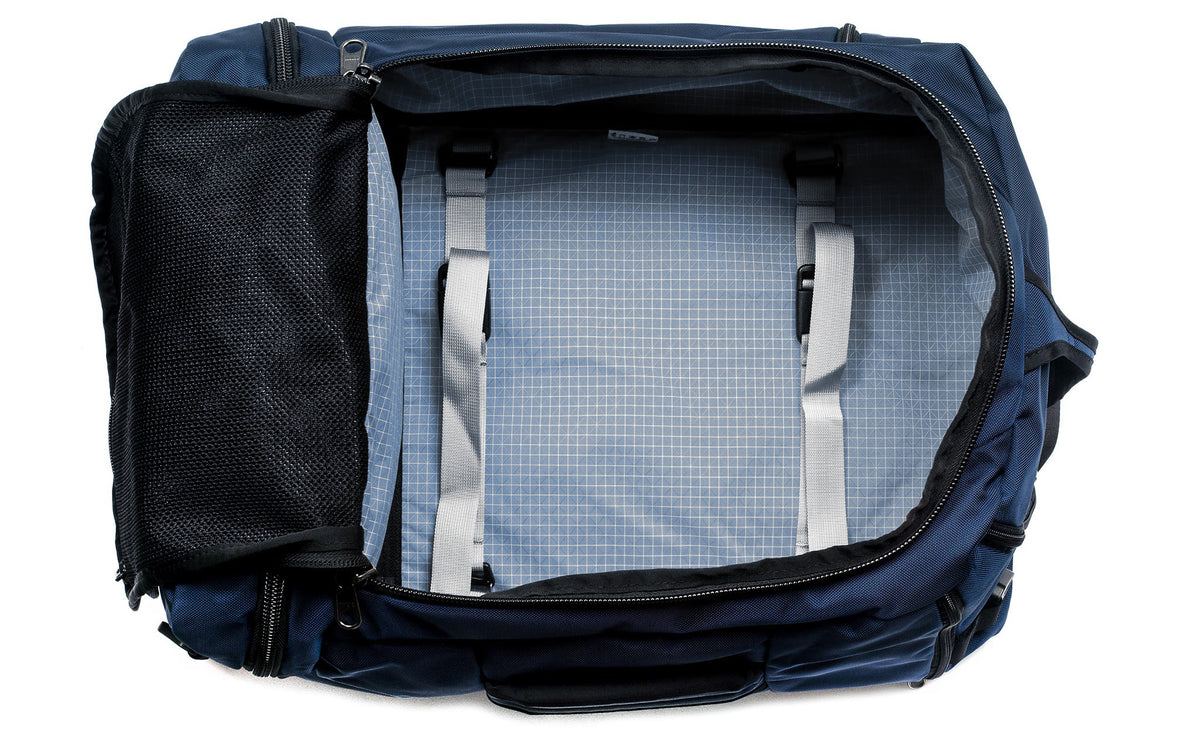 visible variant TB0903-DK7D^^ An open Techonaut 45 with a Deep Blue (dark blue) exterior and a Tidal (faded blue) interior.