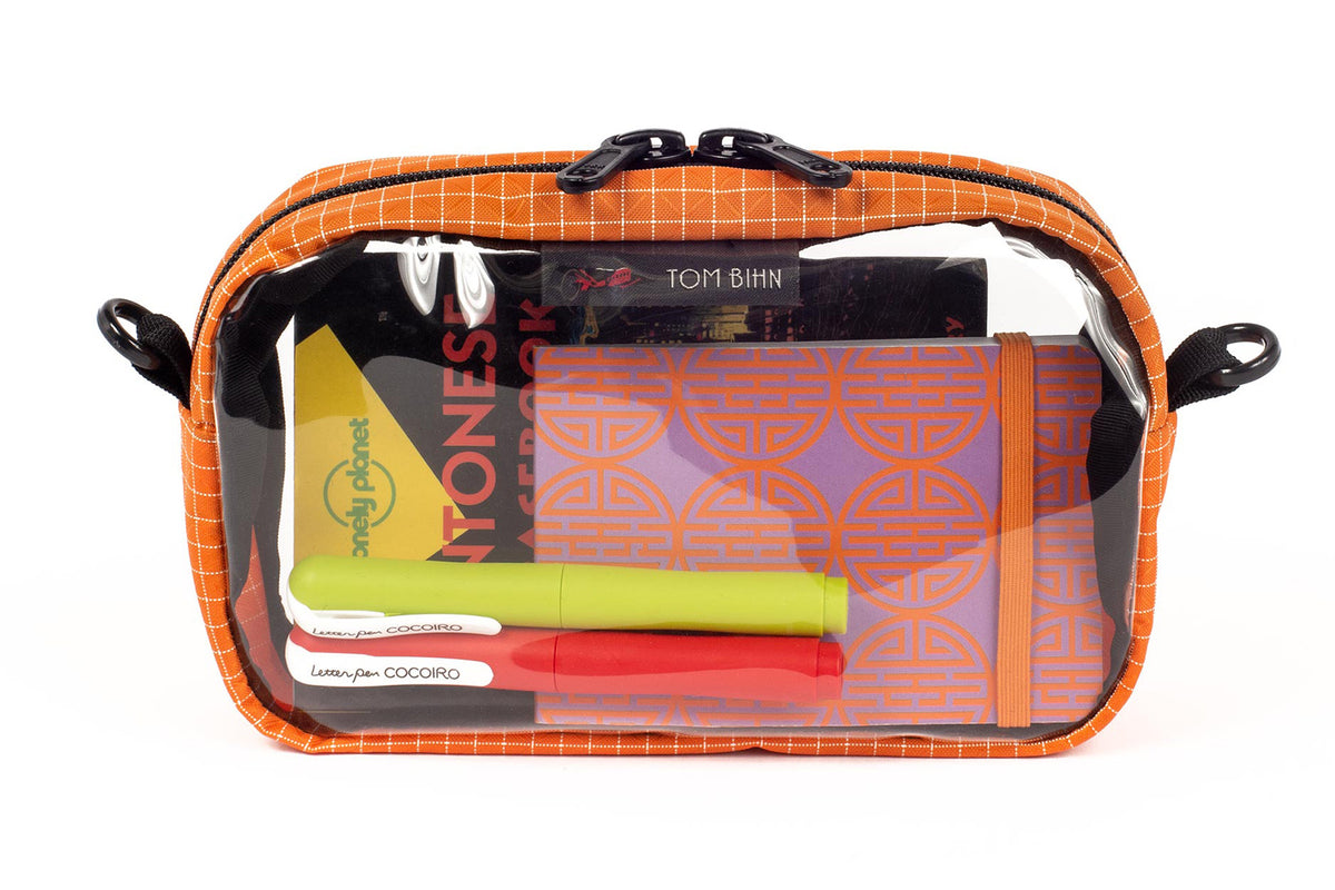 visible variant TB0917-ZD^^A Zest (pale orange) with white grid pattern (Halcyon) 3D Clear Organizer Cube filled with sundries.