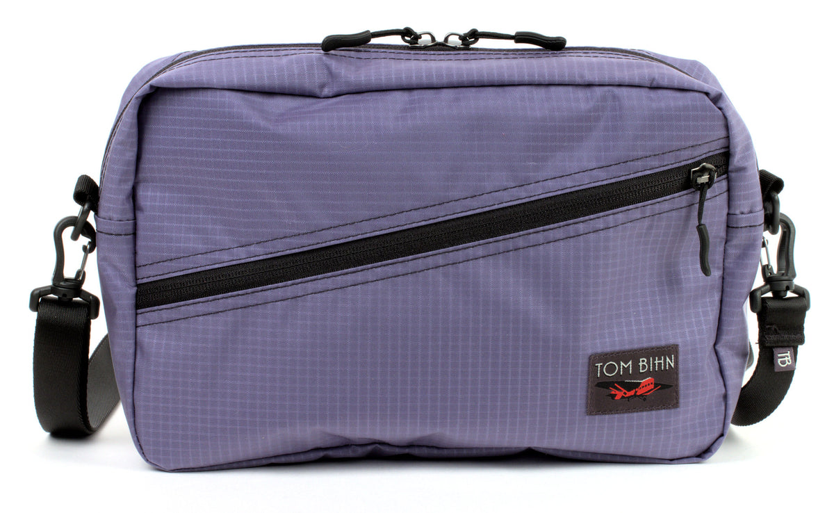 visible variant TB0921-DL^^A Packing Cube Shoulder Bag in Dusk (blue-grey with light blue-grey grid) 210 Cerylon with a shoulder strap attached