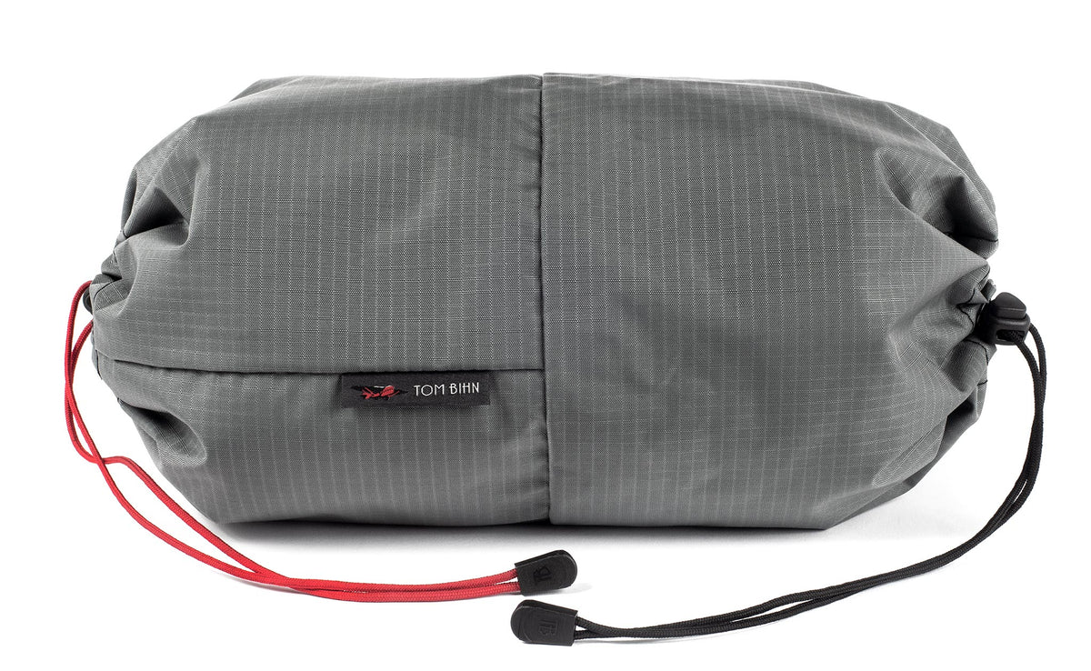 visible variant TB09376-GL^^An Aeronaut 45 Travel Laundry Stuff Sack in Mountain Grey (grey with light grey grid) 210 Cerylon.