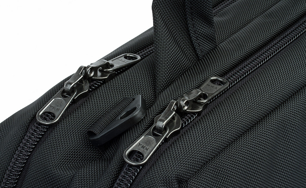 A close shot of the locking zippers on both of the main compartments.
