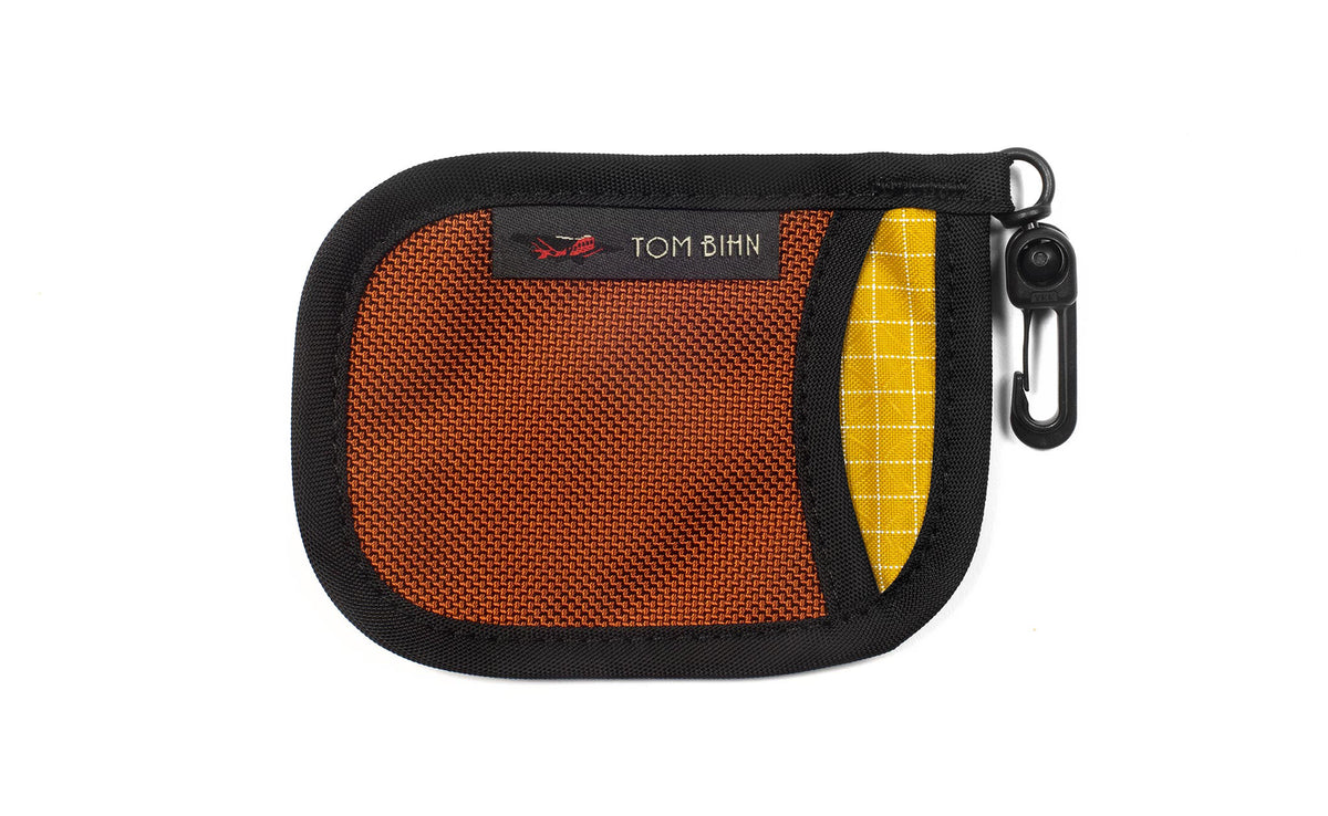 visible variant TB1229-TBOD^^A Pocket Pouch in Burnt Orange with a Solaris interior.