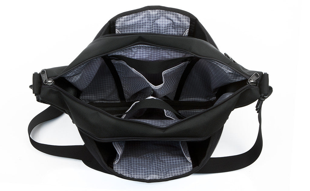 Parental Unit with all compartments open, showing the interior pockets.