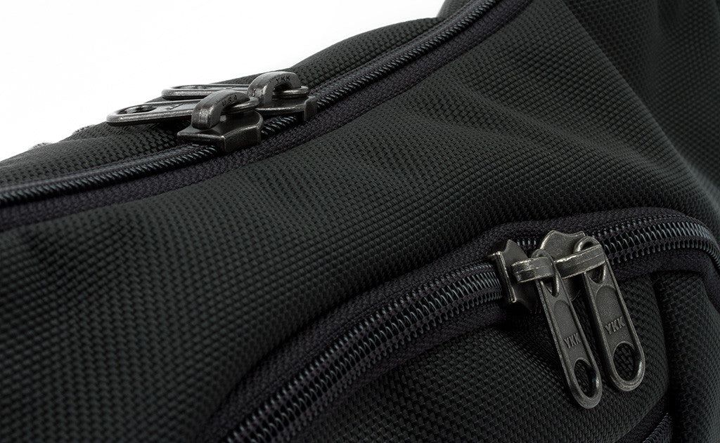 Close shot of front zipper and main zipper.
