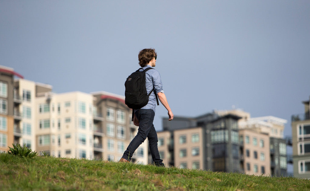 ^^A person walking on a sidewalk with the Synapse 25.