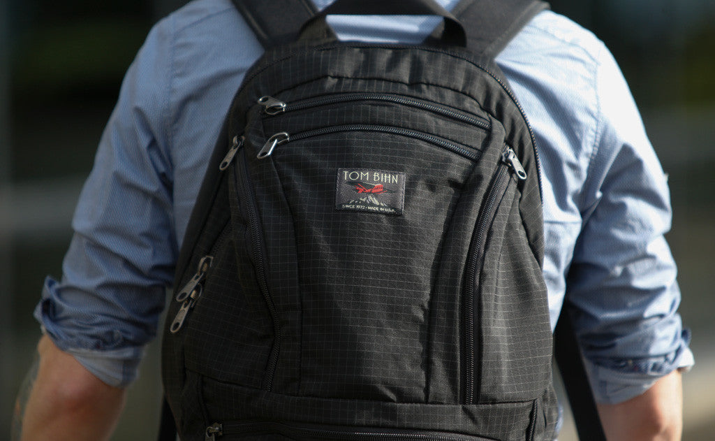 ^^A close shot of a person carrying the Synapse 25.