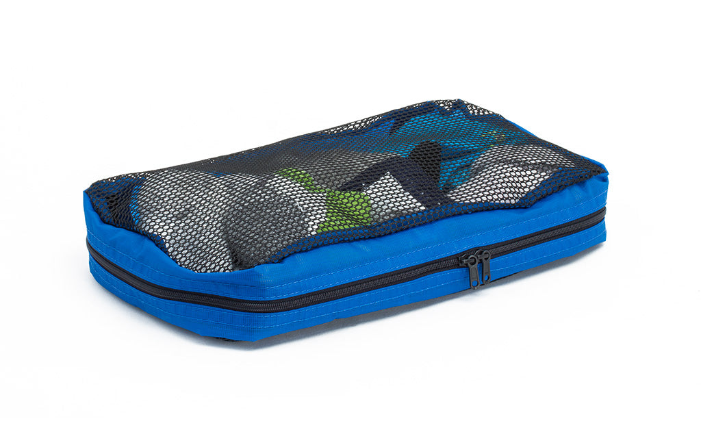 visible variant TB94000-LE^^A full, closed Small Tri-Star Packing Cube in Island (blue) 120 Aether.