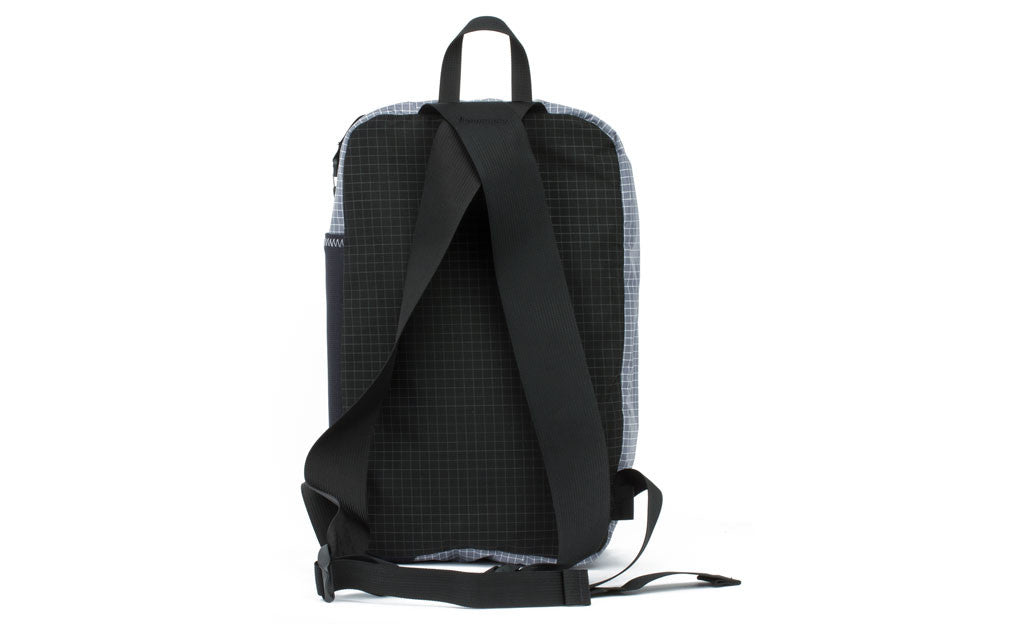 visible variant TB0907-BHND TB0907-DHND^^A reverse shot of the top pocket of the Hero's Journey inverted into a backpack.