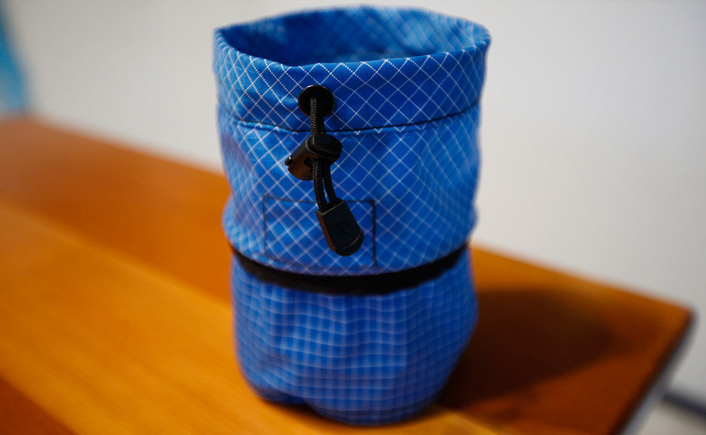 ^A Small Travel Tray with the top pulled up.