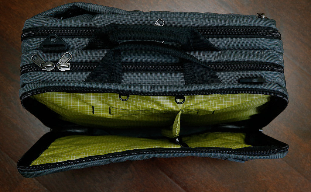 A top-down shot of the front main pocket's zippered divider while zipped.