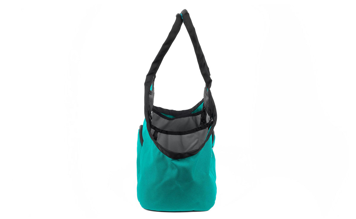 visible variant TB0619-MCLJ^^The Truckasana in Mayura 1000d Cordura with Cloud grey lining. Side view of the bag.