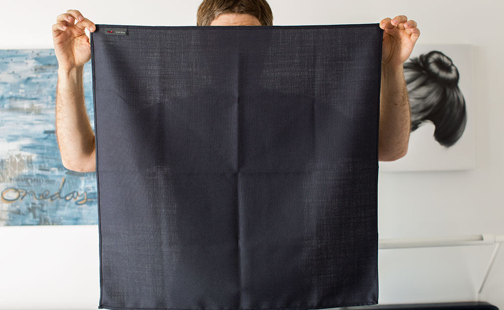 lifestyle visible^^A person holding the Shepherd's Wool Utility Cloth.