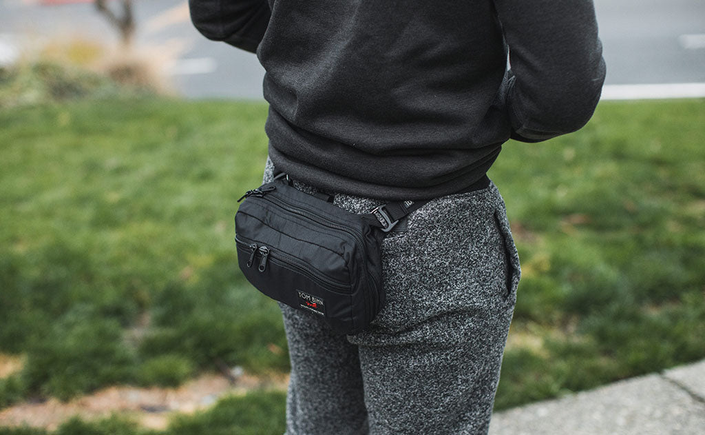 visible lifestyle ^^ A person wearing the HLT2 as a waist pack from behind.