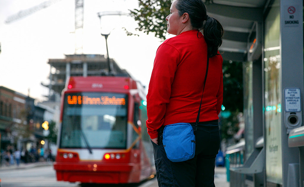 ^^Person wearing the Everyday Cubelet while waiting for public transit.