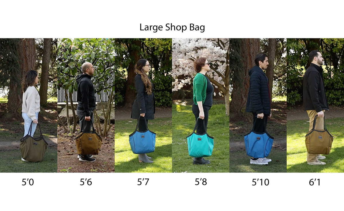 People of different heights standing side-by-side holding Large Shop Bags.
