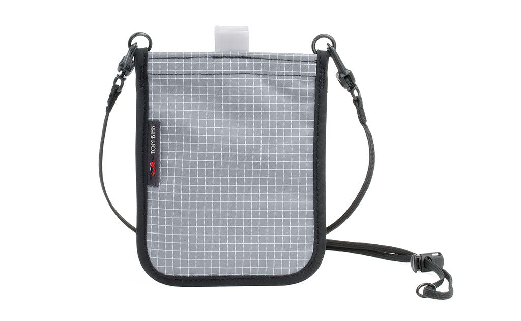 visible variant TB0932-ND TB0931-ND^^The Passport Pouch in Northwest Sky (light grey with white grid) 200 Halcyon.