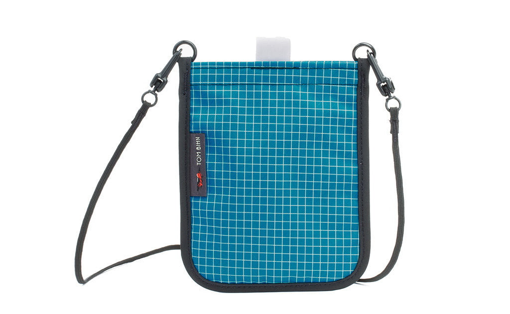 visible variant TB0931-FD TB0932-FD^^The Passport Pouch in Fjord (dark blue with white grid) 200 Halcyon.