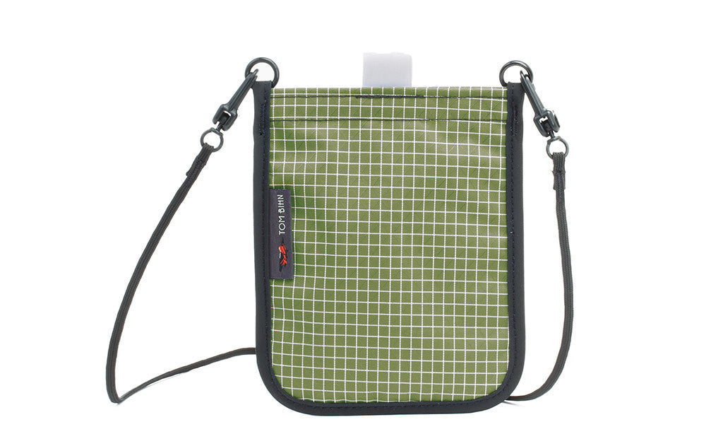 visible variant TB0931-8D TB0932-8D^^The Passport Pouch in Taiga (olive green with white grid) 200 Halcyon.