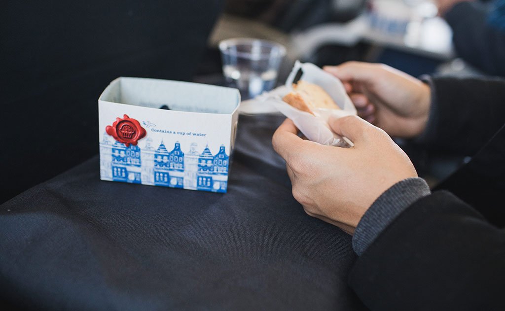 lifestyle visible^^The Shepherd's Wool Utility Cloth as a tray table tablecloth.