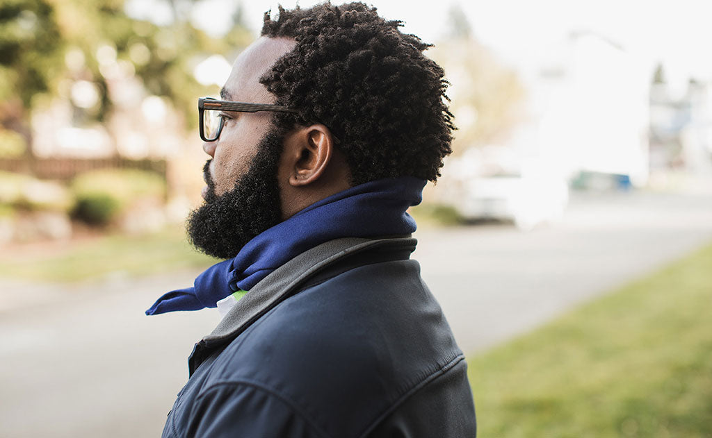 lifestyle visible variant^^A person wearing the Shepherd's Wool Utility Cloth as a kerchief.