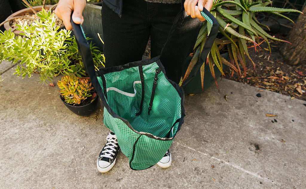 ^^Small Original Shop Bag in Sitka empty and held open by the handles.