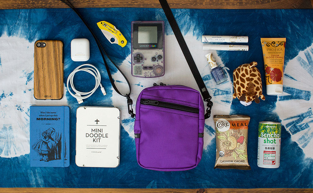 ^^Everyday Cubelet with items around it that will fit inside: snack bar, small drink, doodle kit, phone, mini knife, game boy, phone cord, airpod, make-up, stuffed animal.